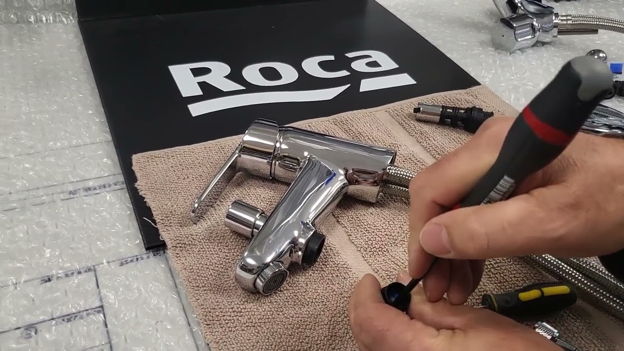 Roca - Remplacement d'un inverseur sur mitigeur bain douche Victoria.