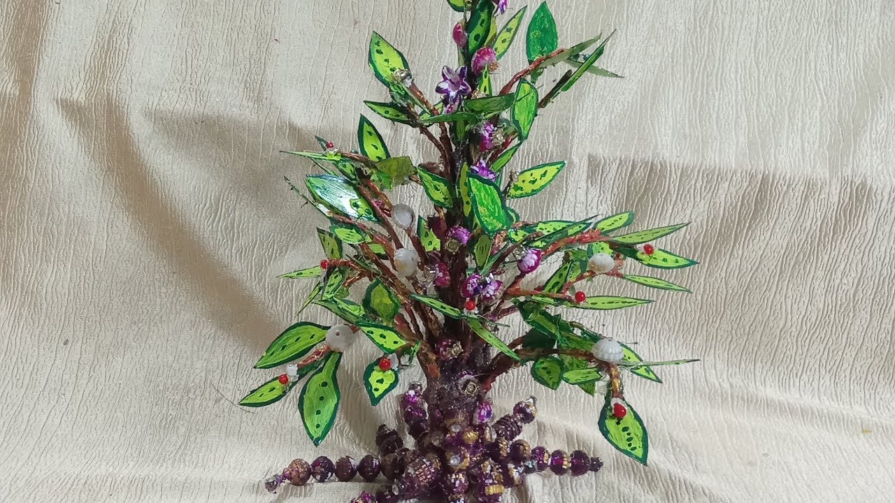 Hand made decorative plant #leaves#plastictree#metal#wastematerial#craftidea