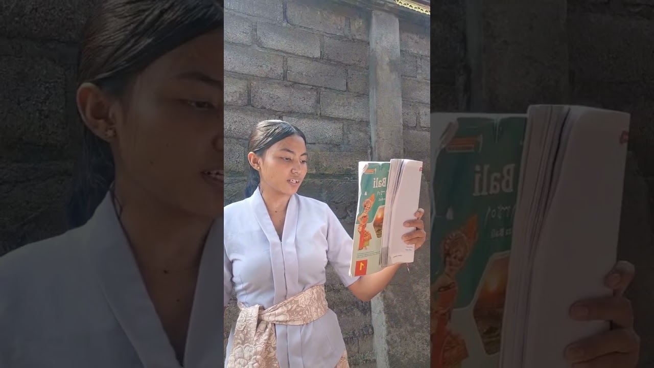 ngewacen puisi Bali anyar sane memurda "liang lan galang"
