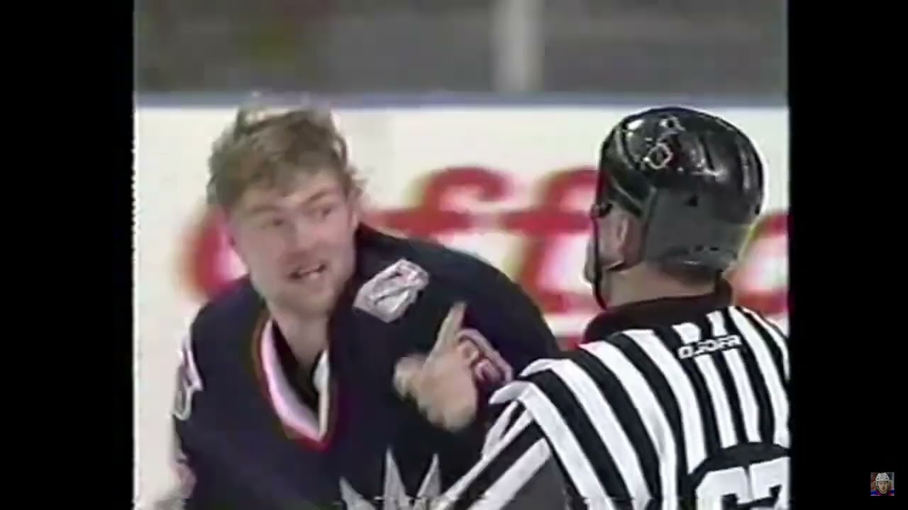 Grosek goes after Khristich