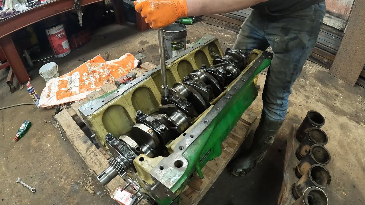 Installing new pistons and crank shaft! | John Deere engine rebuild