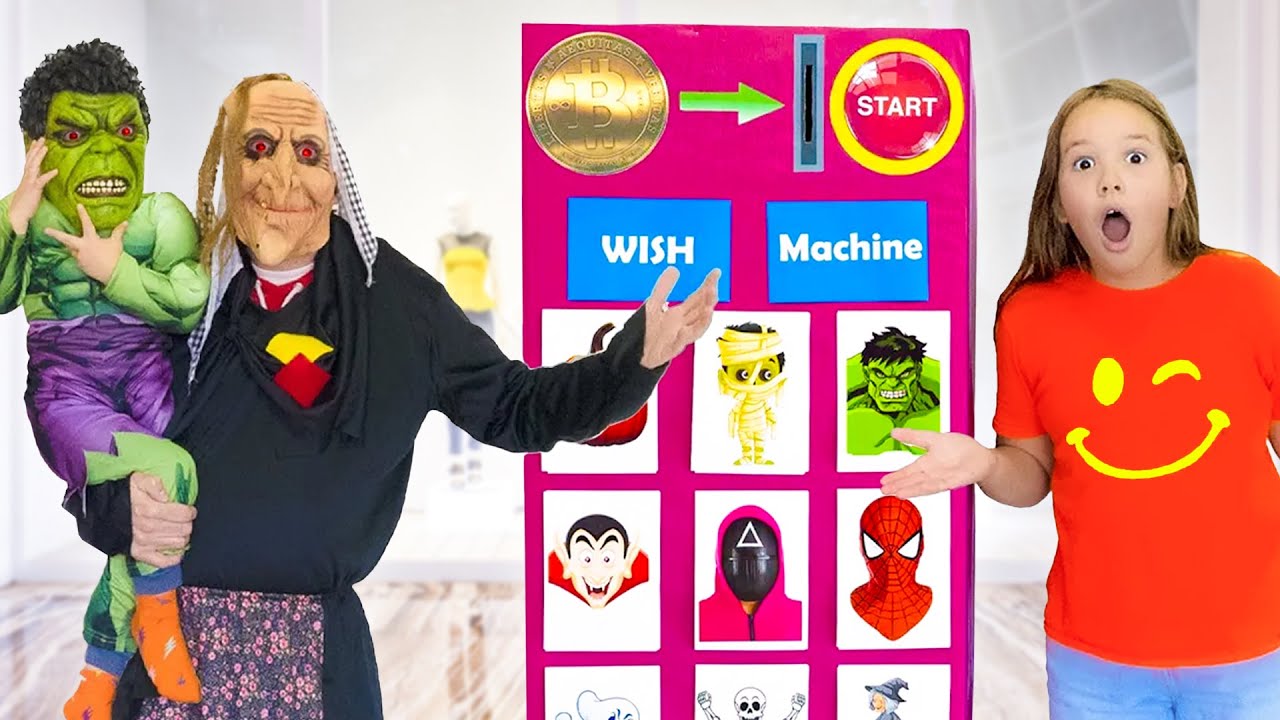 Amelia, Avelina & Akim having fun with a costume vending machine