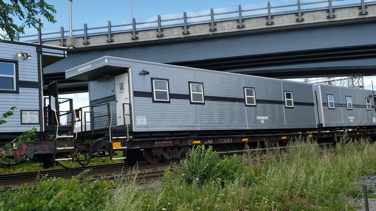 TRAINS CN New Bunk Cars and Bright Orange Sclair Hopper on Mixed Freight at Dorval