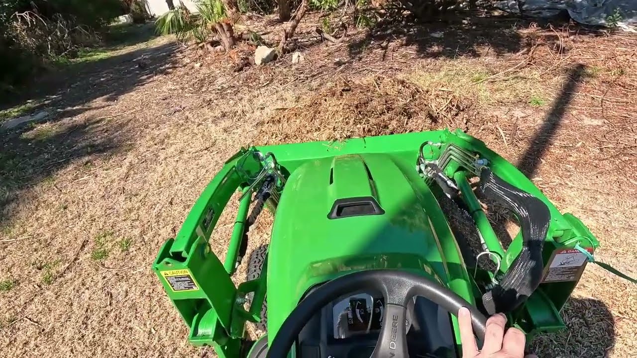 Moving Mulch and Logs with X739 Loader