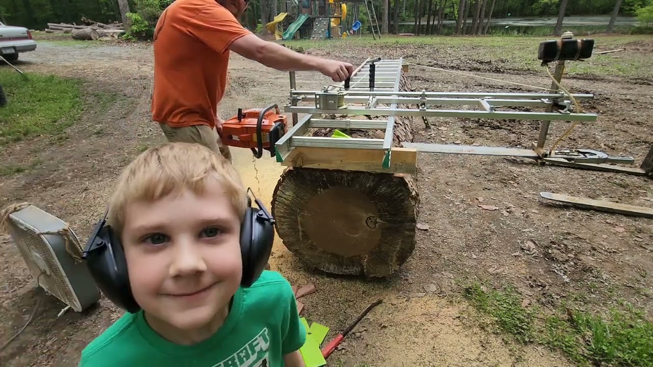 slabbing a huge pine with my granberg chainsaw mill, 3120xp.