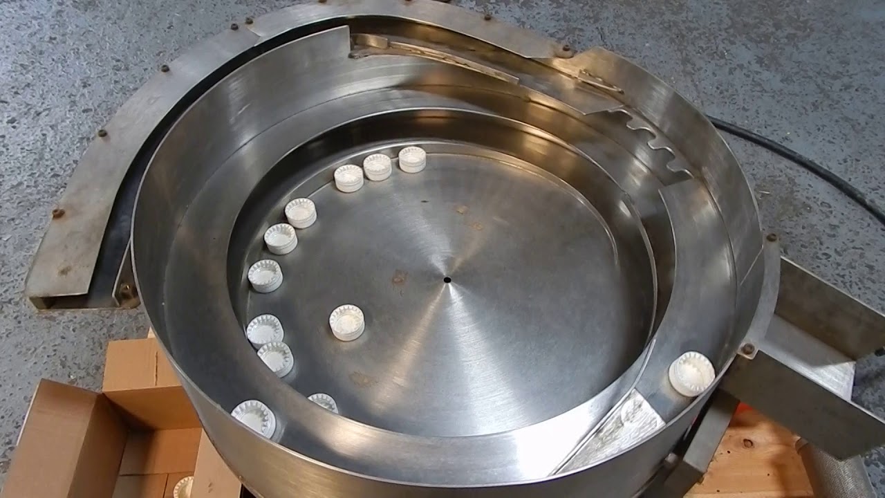 Cap feeder