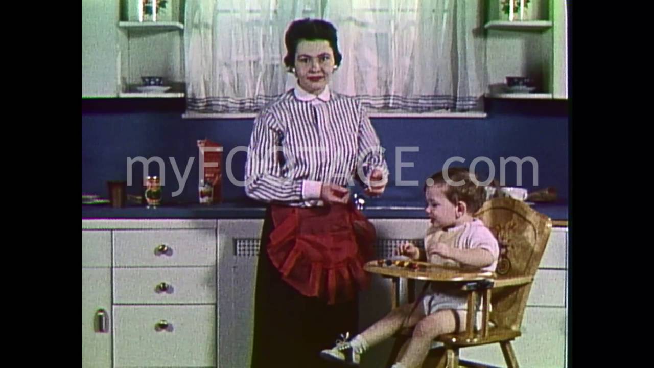 1950s Baby in Highchair Tosses Food