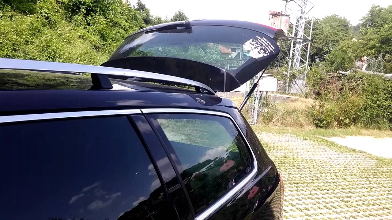 Passat B7 Open/close electric trunk from driver door.