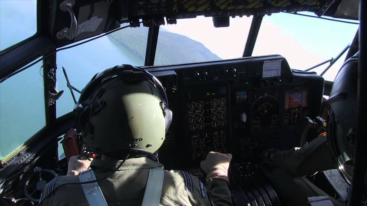 Air Force Hercules drops Army Vehicle