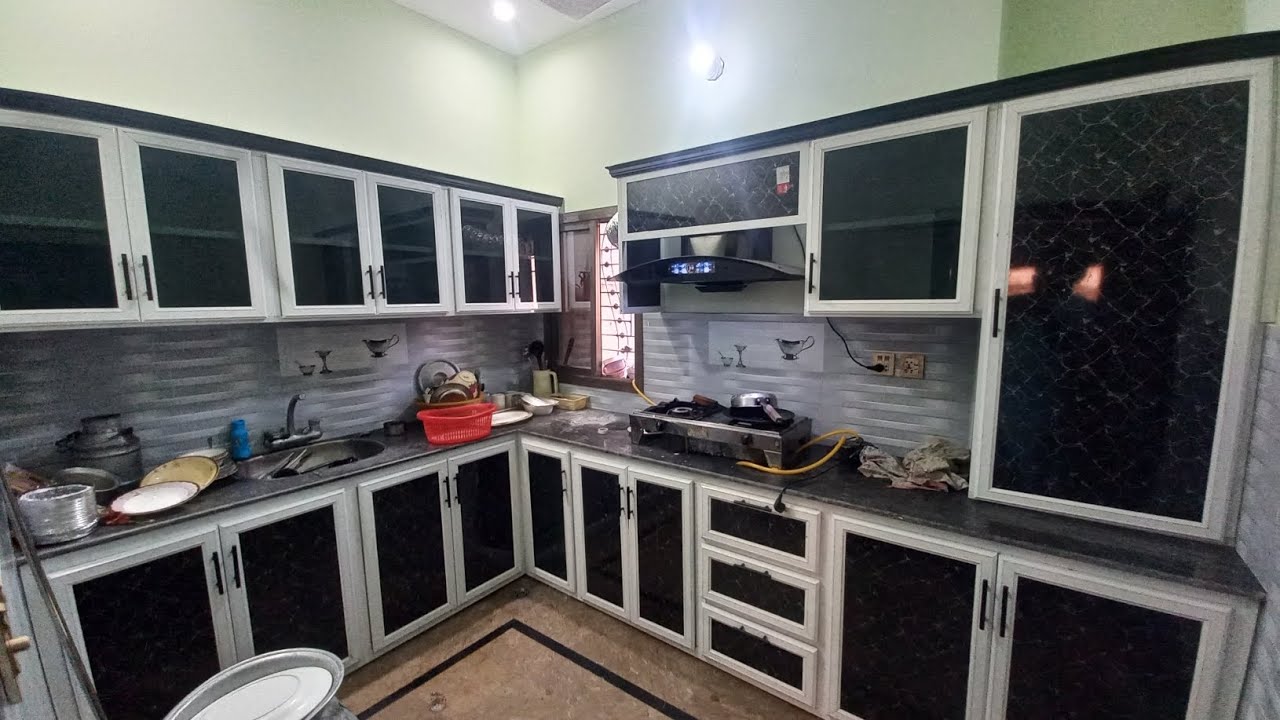 Latest design of aluminium kitchen cabinets with grey glass and black colour sheet check this video