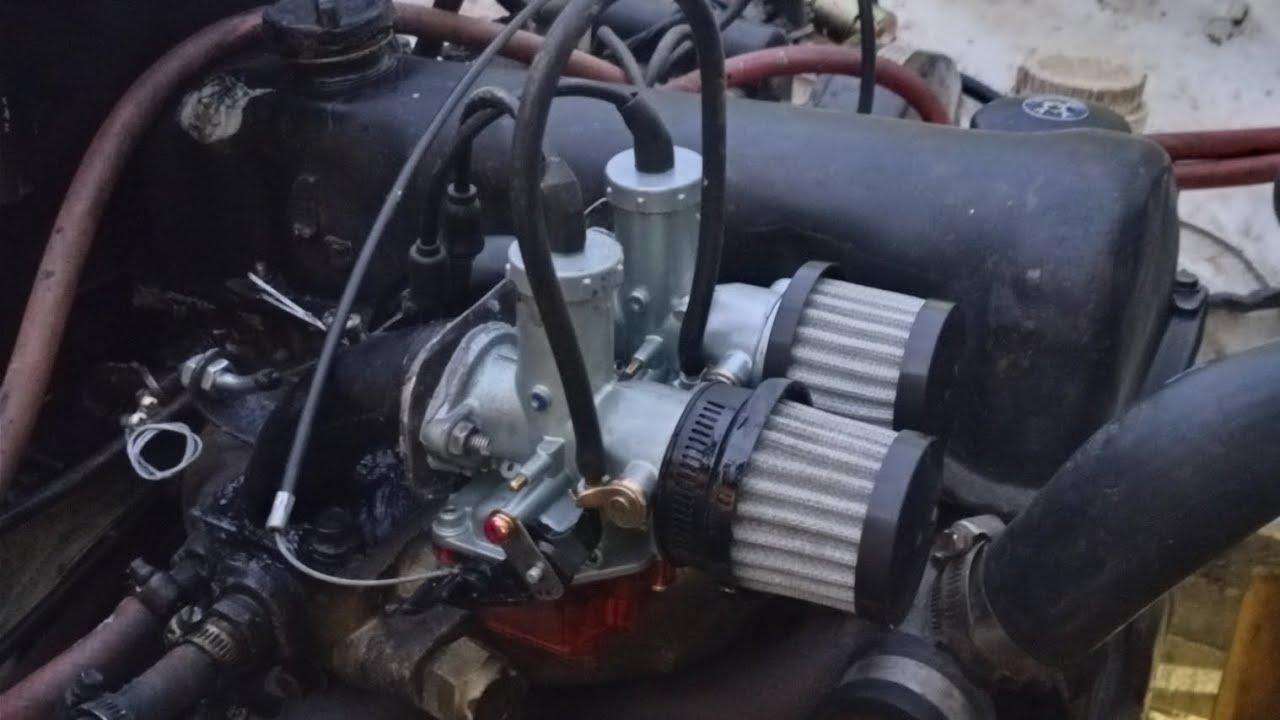 Cómo instalar Doble carburador de moto en un auto.