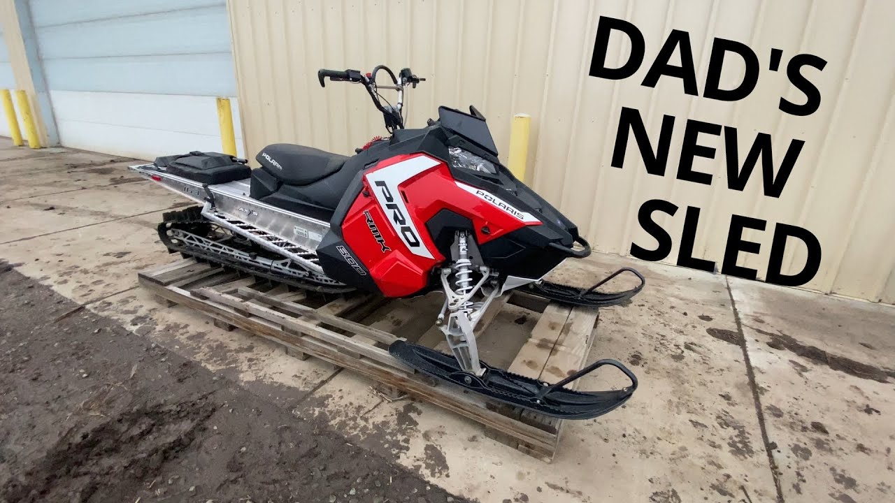 Buying Dad a new snowmobile