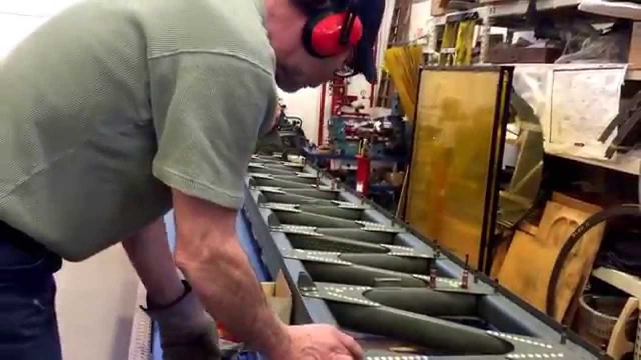 Riveting gussets to wing spar on B-17 restoration.