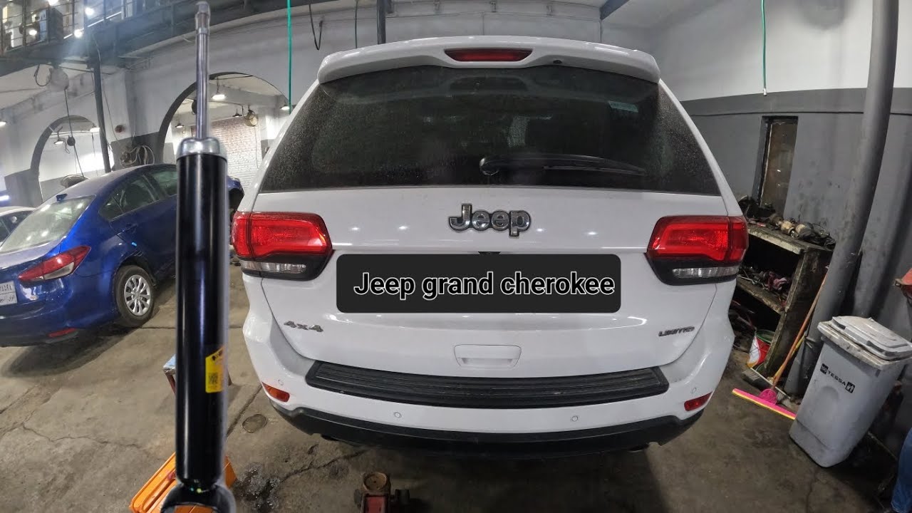 reemplazo amortiguador trasero jeep grand cherokee
