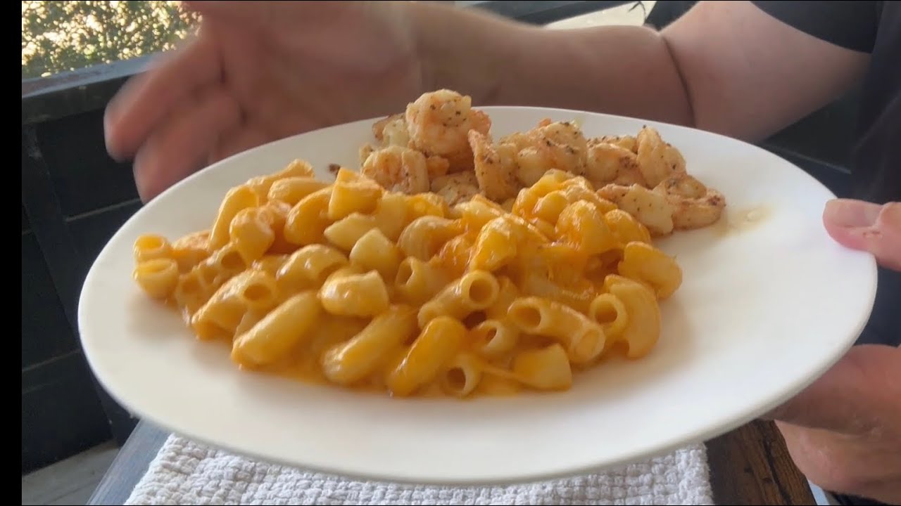 Delicious baked mac & cheese with a side dish. It was definitely yummy.