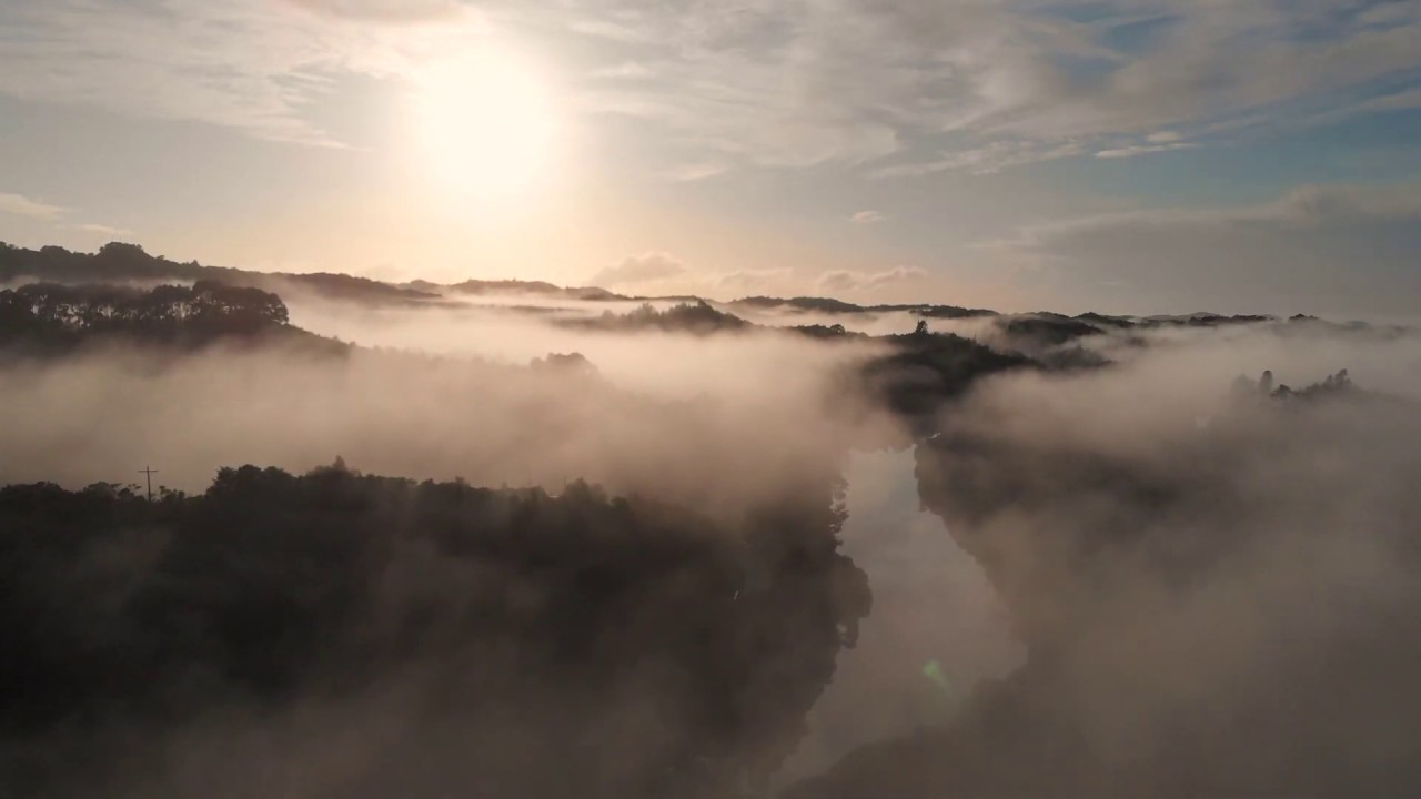 Epic sunrise above the low clouds. Drone, New Zealand