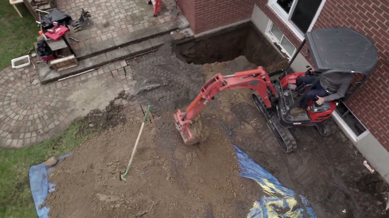 small excavator digs up
