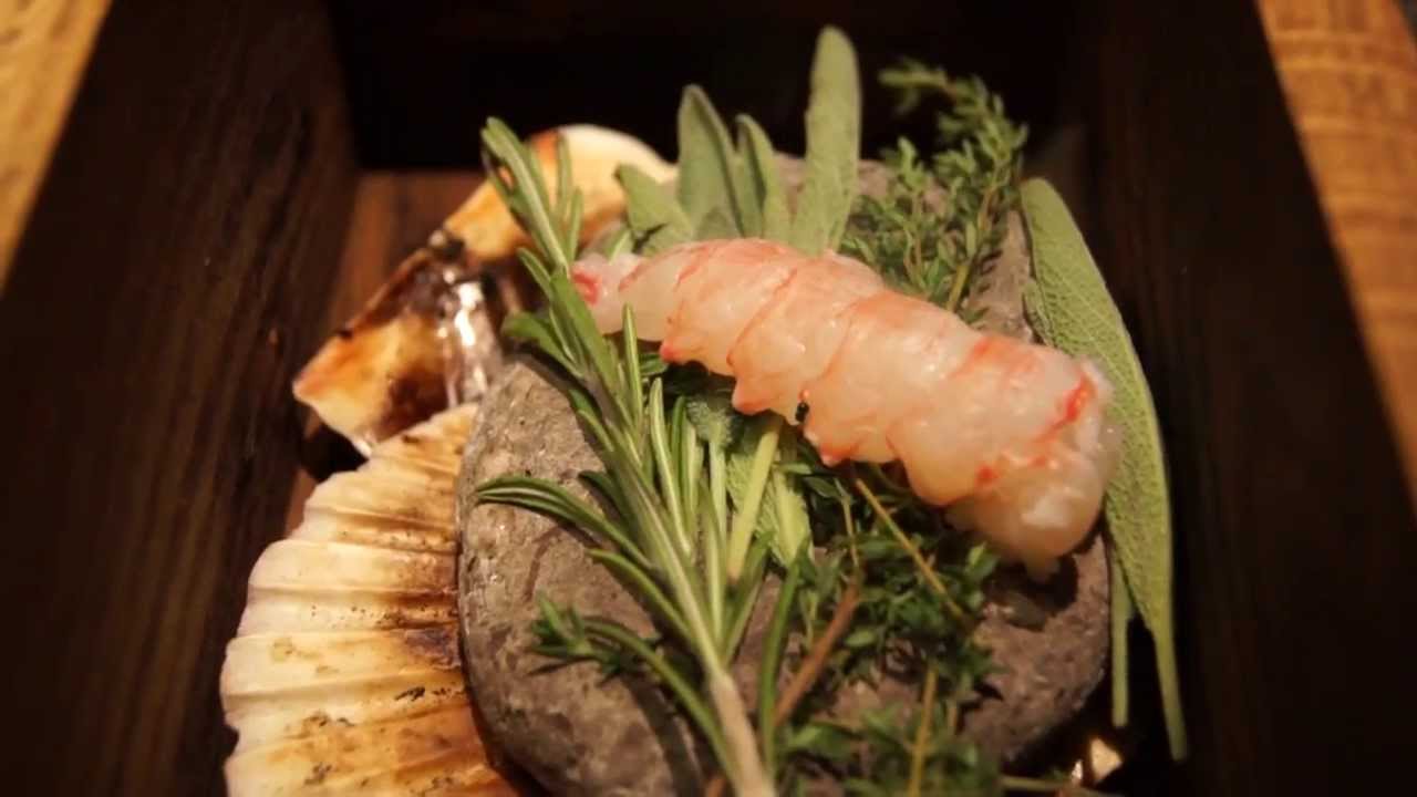 Magnus Ek prepares a signature dish at Oaxen Krog, Stockholm