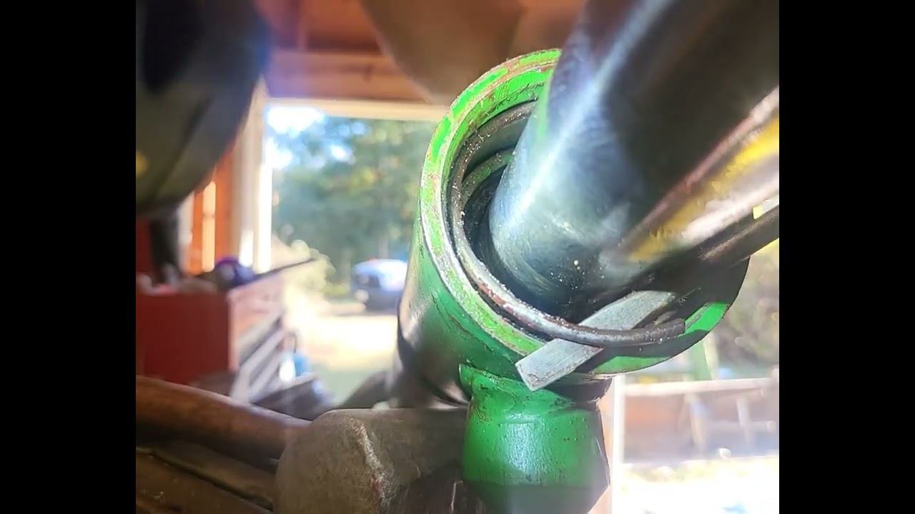 John Deere 175 loader lift cylinder snap ring removal
