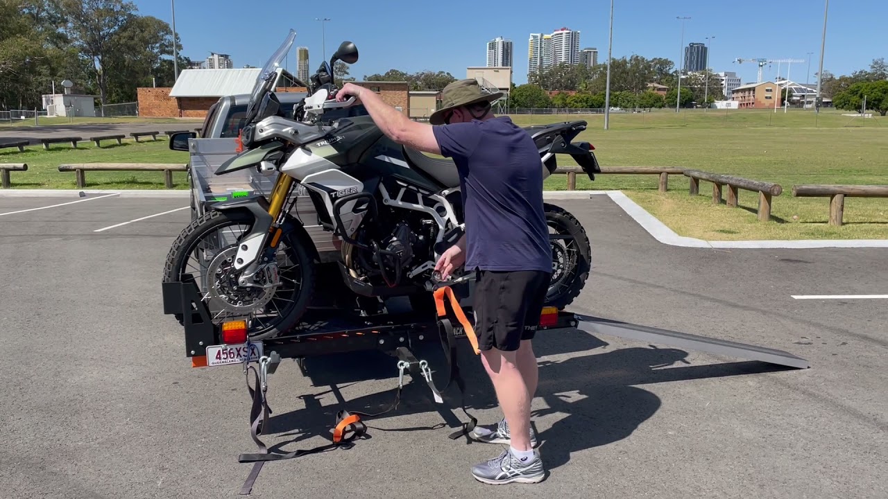 Rack N Roll / Rack N Ride ADVENTURE Carrier unloading your bike.