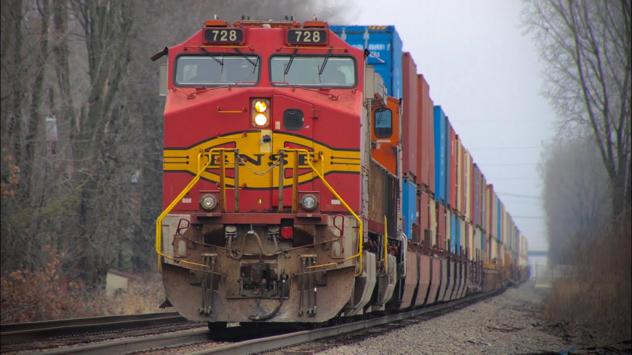 NS 266 passes Flint at MP 11 with BNSF 728 (Bonnet) leading!!!