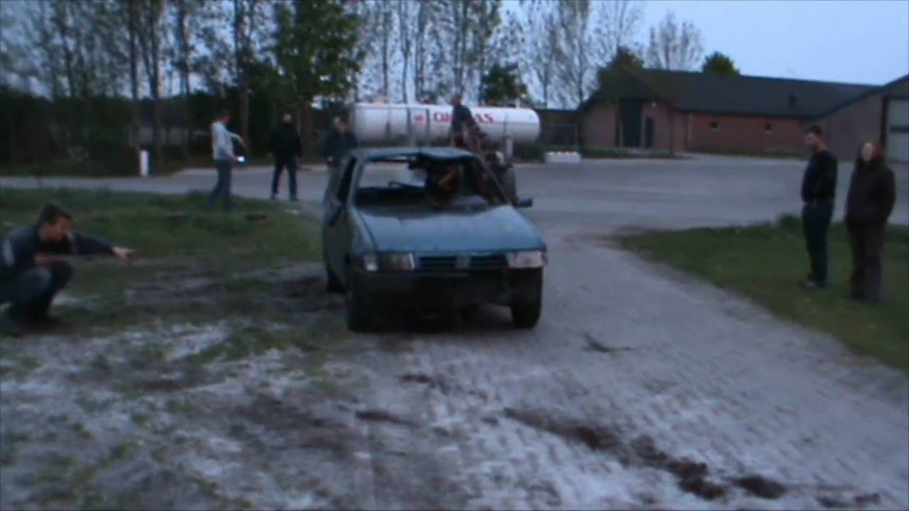 Fiat Uno carjump through coach.