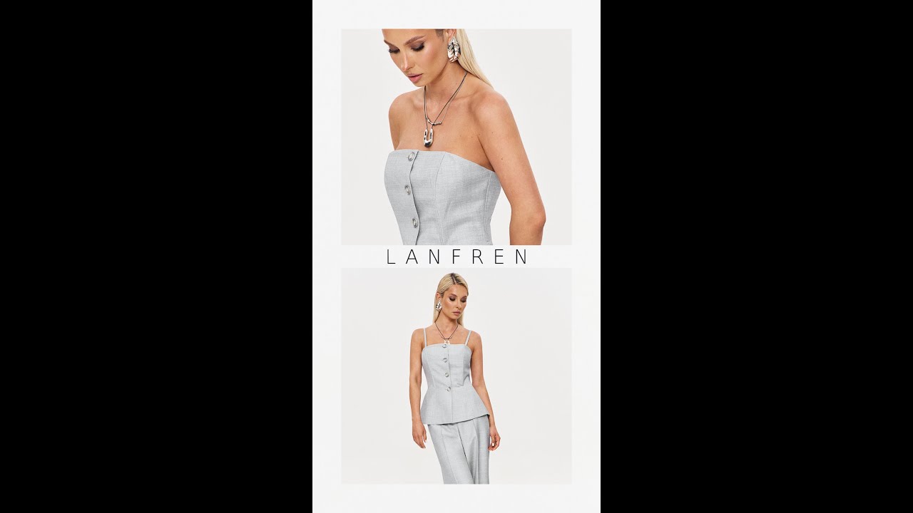 Stylish balance of comfort and femininity for business meetings: a corset top and culottes.