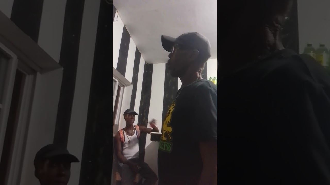 Vybz With Super wrong up touching super shoulder