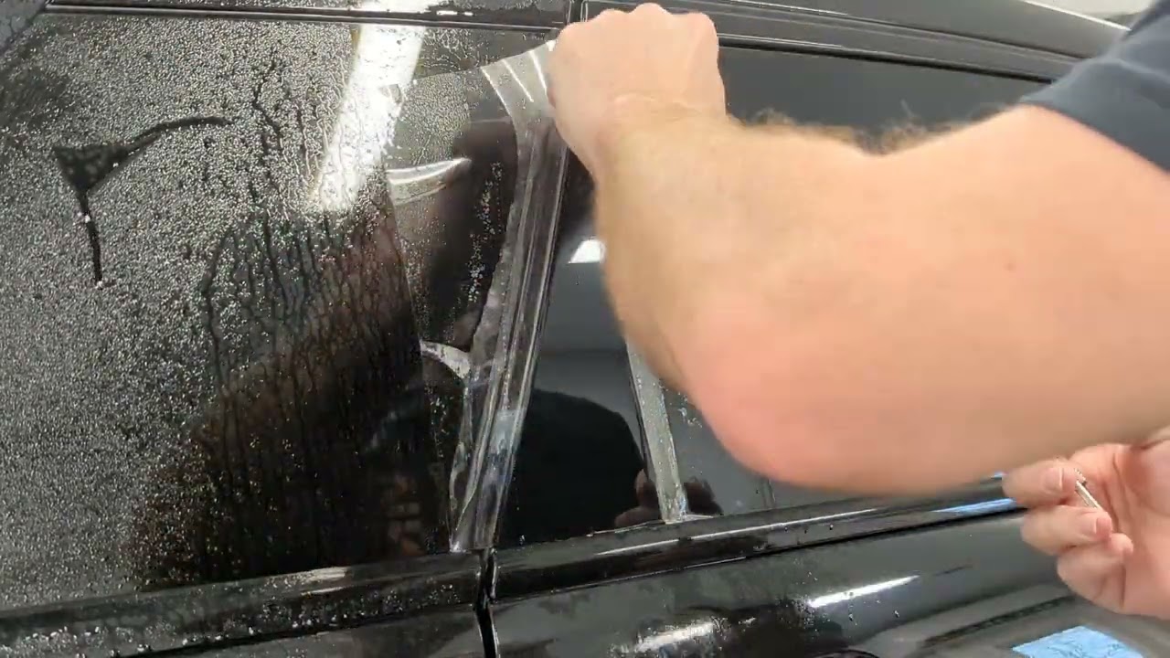 Timelapse applying Hexis Bodyfence PPF on side C pillar