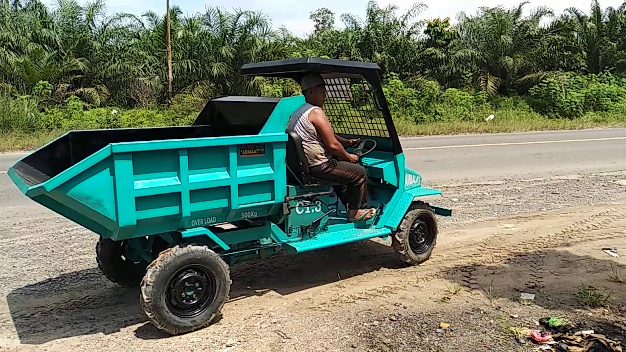 Alat angkut buah sawit. Untuk lansir dari kebun.. mesin diesel Yanmar