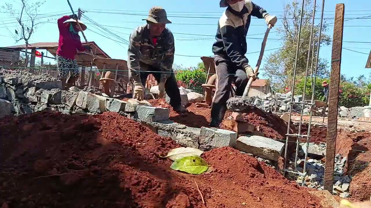 A day working as a construction laborer: Sweat, tears, and hurried bowls of rice.