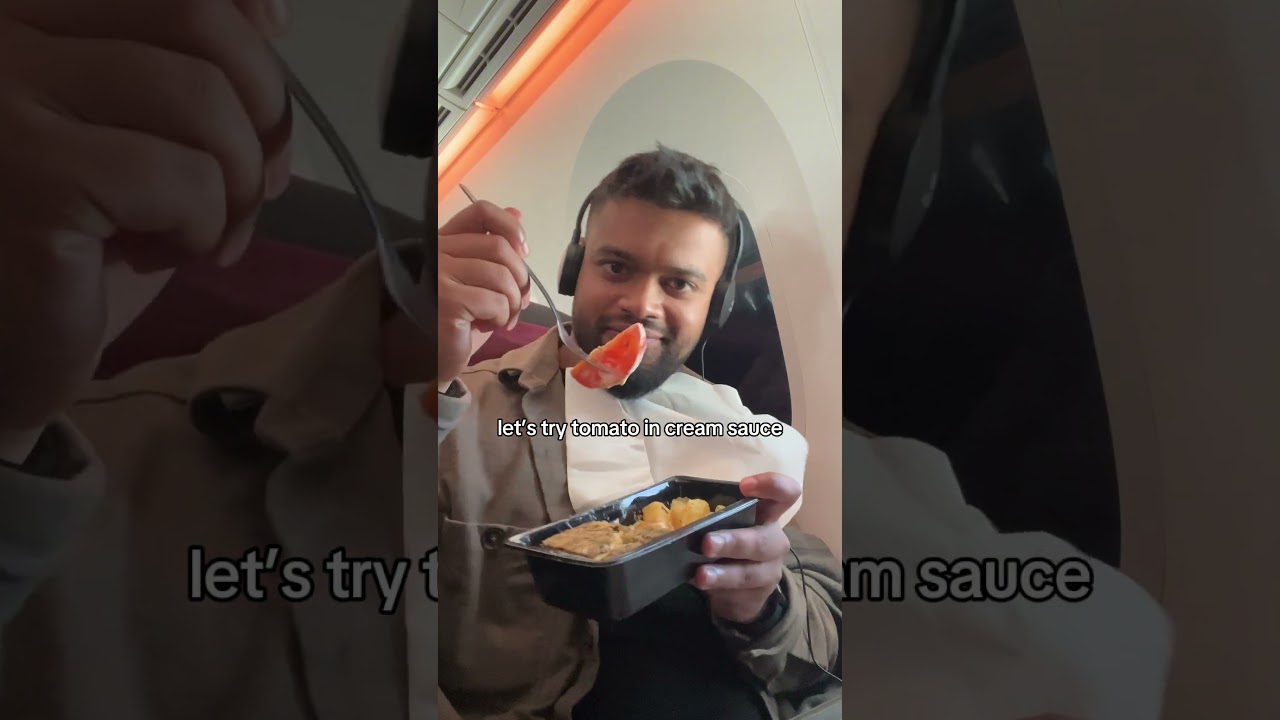 Обзор еды Qatar Airways только с помощью мимики