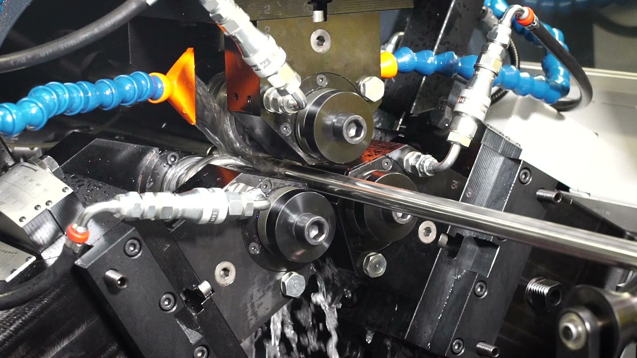 EXTRUDED FIN TUBES ROLLING MACHINE