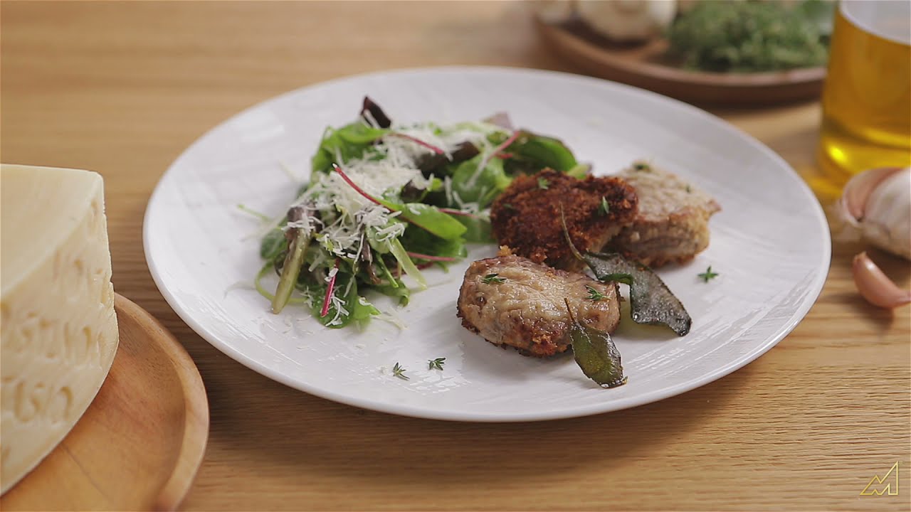 Schweinemedaillons mit Montasio und Brotkruste