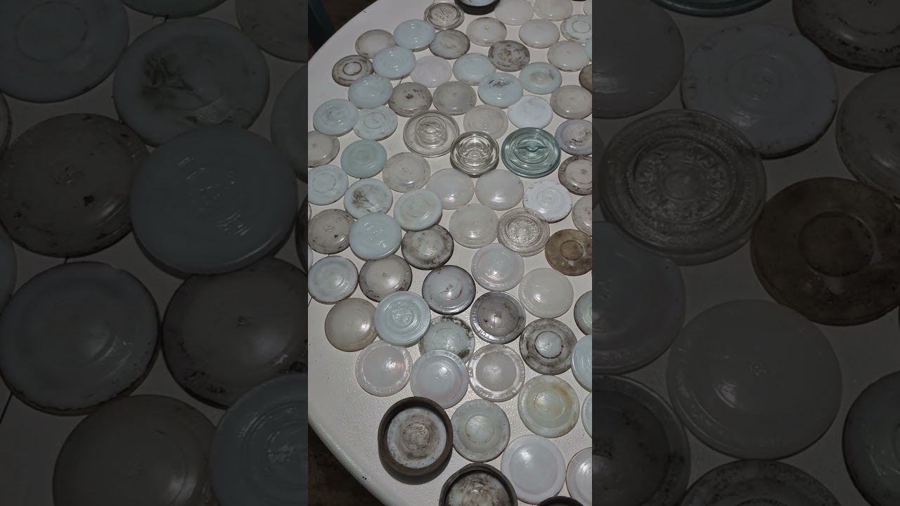 All the canning jar lids I've found while metal detecting. 