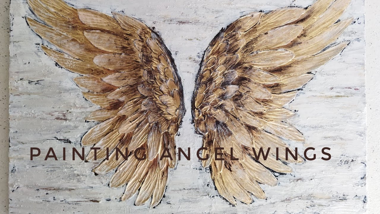 Interior painting wings with texture paste, panels of angel wings with their own hands, golden wings