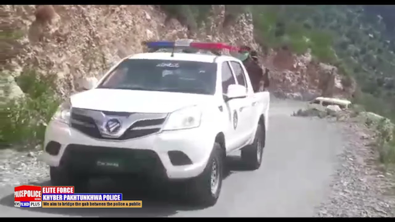 Flag march led by District Police Officer Hangu (PSP) Ikramullah Khan.