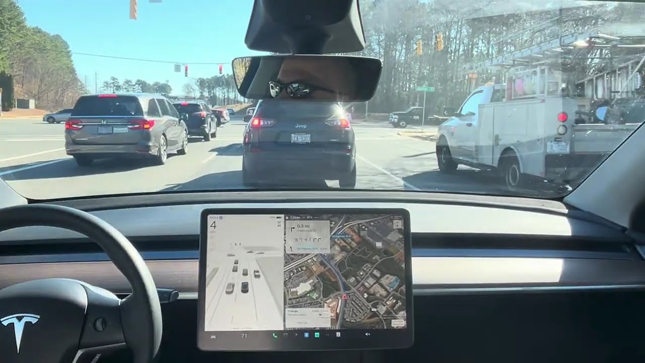 Tesla Model Y Performance 12.6.4 - Navigating around a mail truck