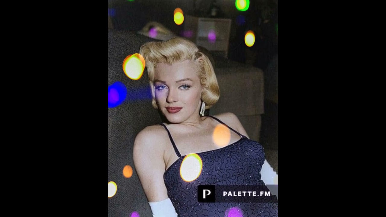 Marilyn Monroe photographed by Earl Wilson after Charles Coburn's birthday party dinner on 6/17/53.