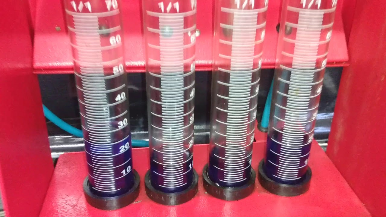 Qual produto devo colocar na máquina de limpeza de bicos injetores