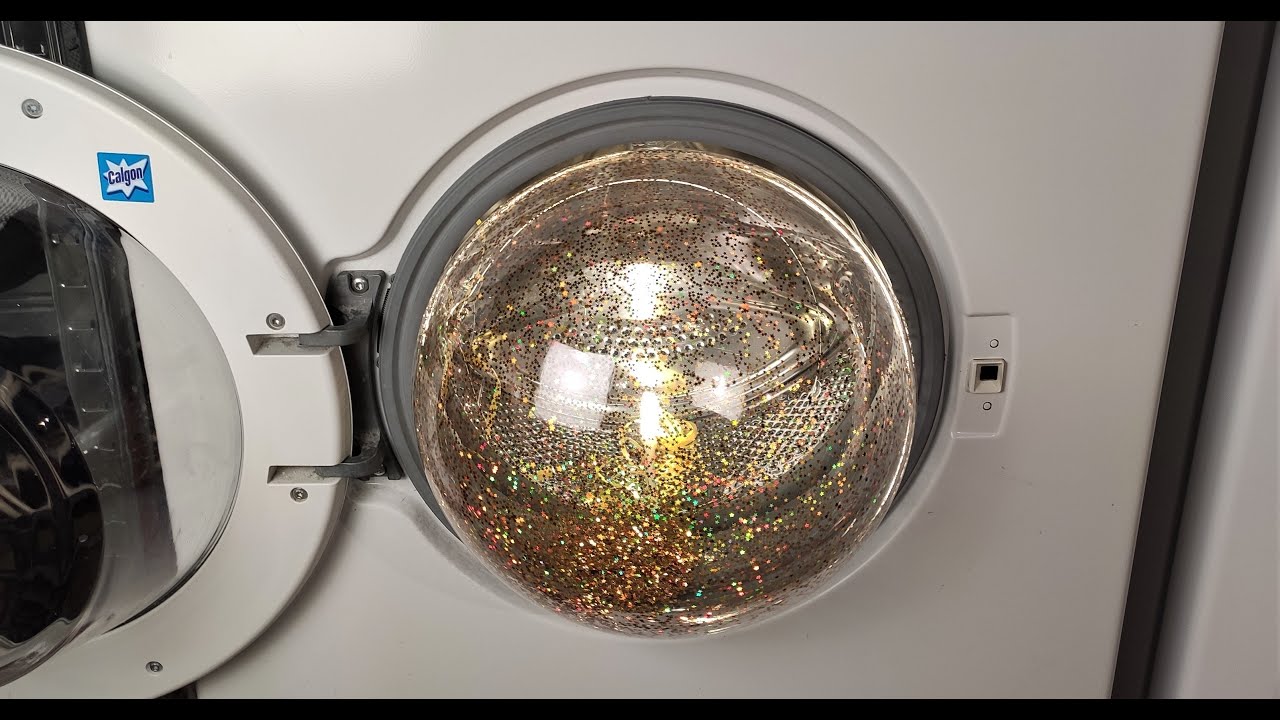 Experiment - Balloon with Golden Confetti - in a Washing Machine