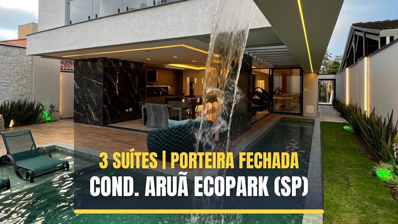 PORTEIRA FECHADA: Casa de alto padrão Condomínio Aruã Ecopark (SP) com 3 suítes + piscina c/ cascata