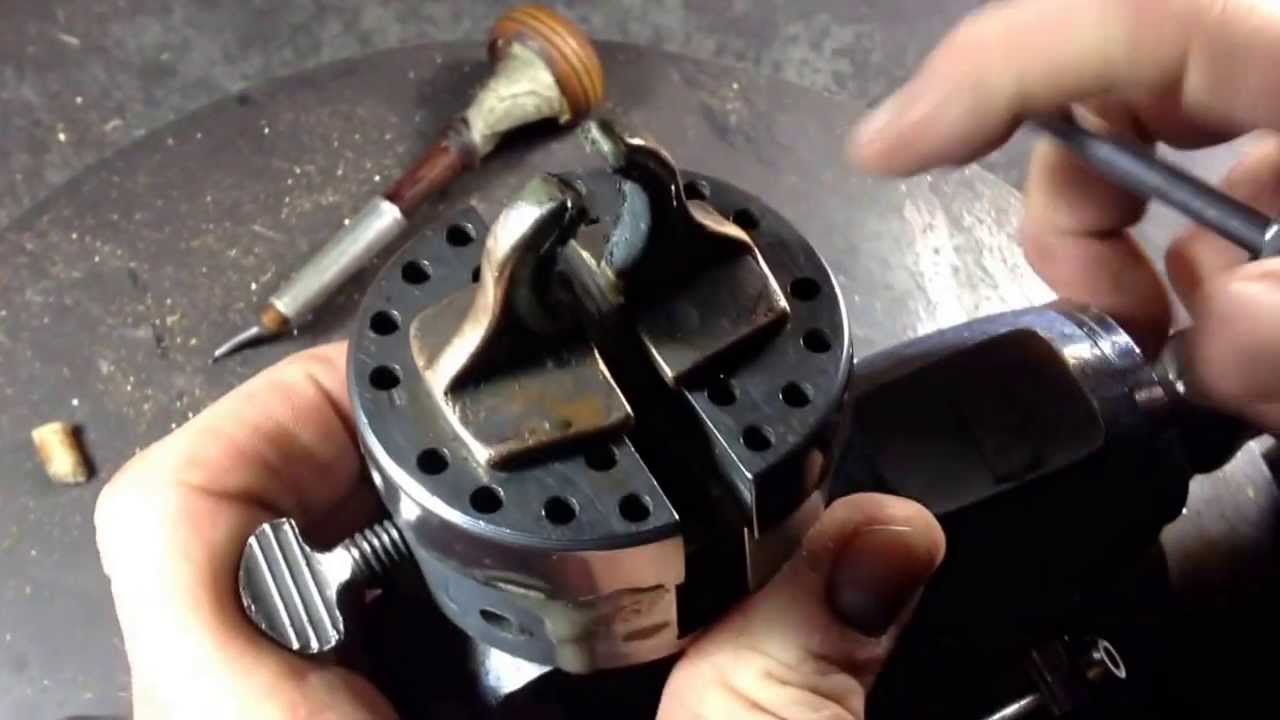 Holding method for hand engraving inside rings.