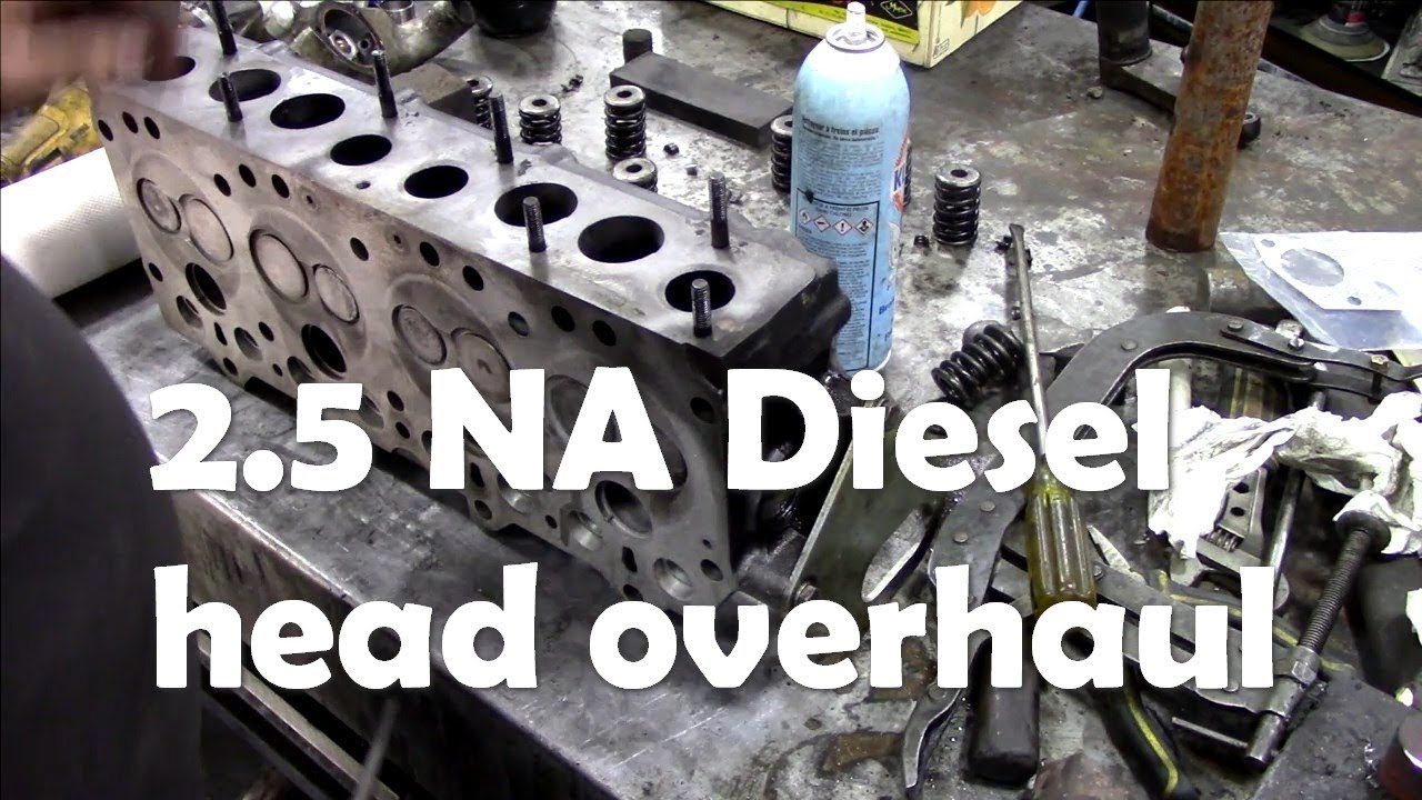 2.5 NA diesel stripping the head. Inspecting and cutting valves with a few problems!
