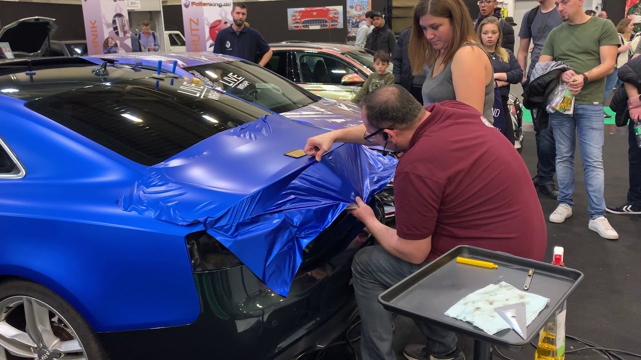 Folienking | Folierung einer Heckklappe auf der Essener Motorshow