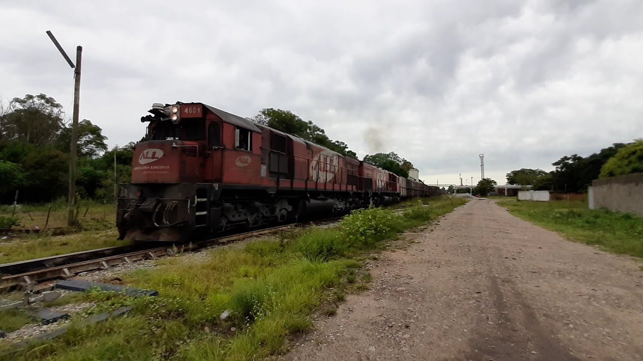 DUPLA DE GT22 DA ALL TRACIONANDO JUNTAS TREM COM FERTILIZANTES.