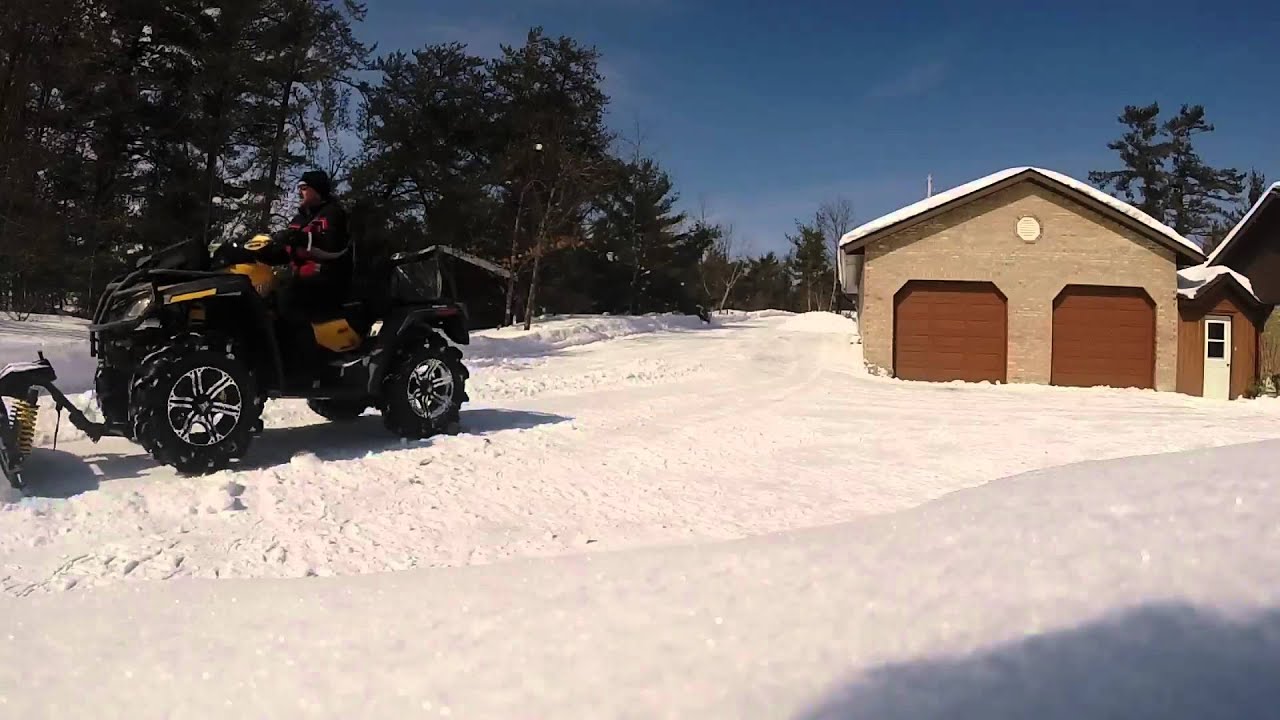 can am xmr 800 plowing with alpine flex plow