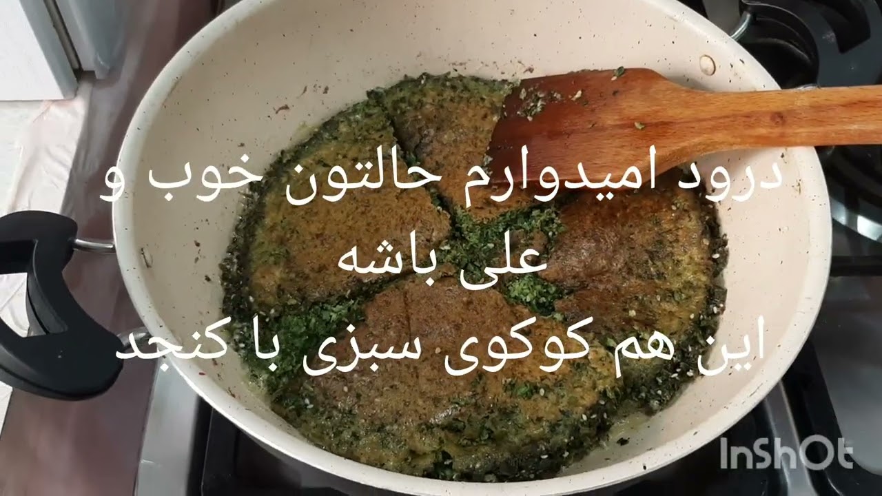 ک