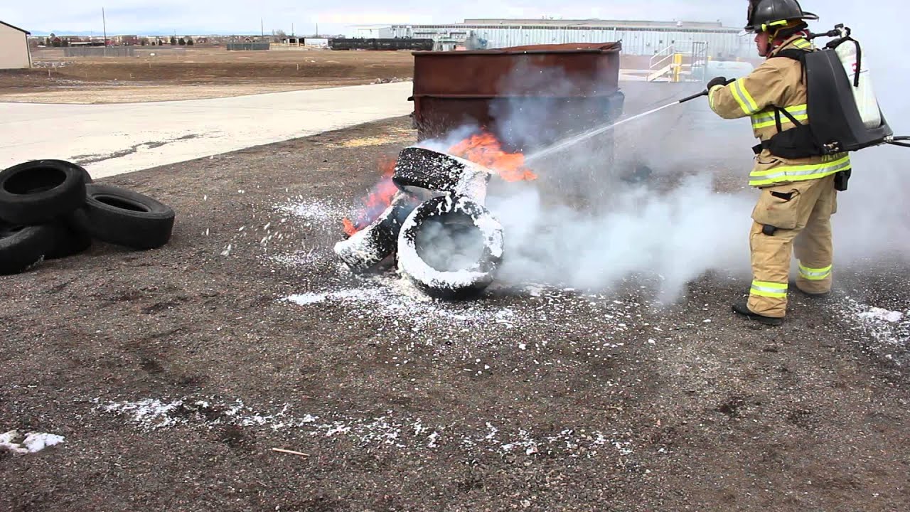 Intelagard Macaw backpack putting out a tire fire