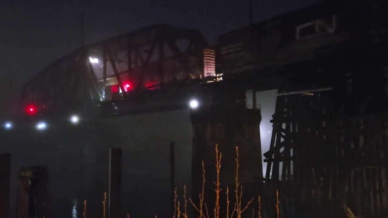 CN Train crossing the Lulu Island/CNR Swing Bridge at night in the fog. #railway #bridge